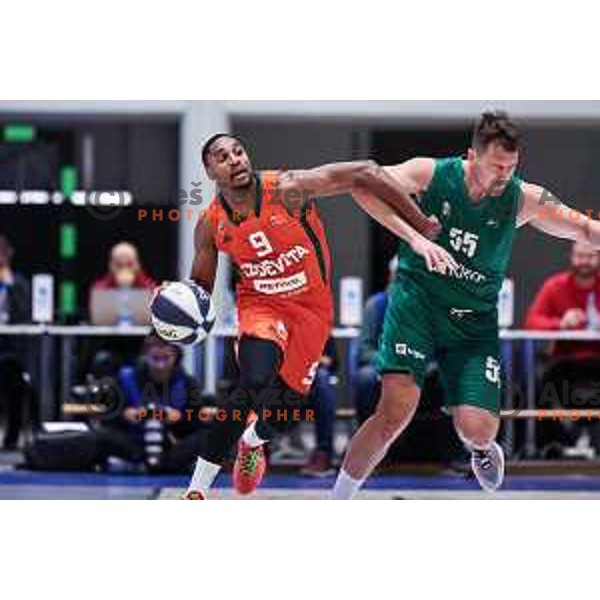 Brynton Lemar and Jakob Cebasek in action during Slovenian SuperCup basketball match between Cedevita Olimpija and Krka in Tri lilies Hall, Lasko,, Slovenia on September 17, 2024
