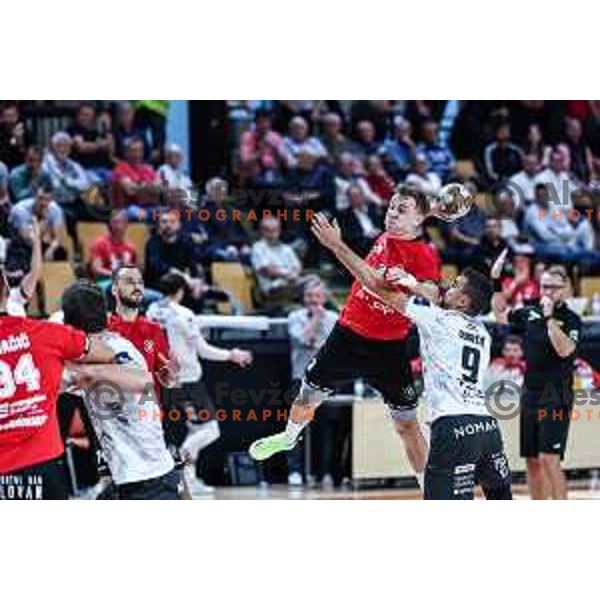 Stas Slatinek Jovicic in action during 1.NLB League handball match between LL Grosist Slovan and Trimo Trebnje in Ljubljana, Slovenia on September 20, 2024
