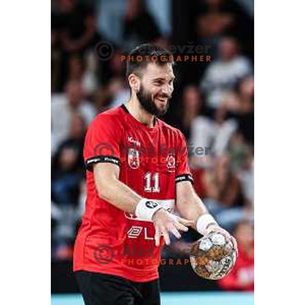 in action during 1.NLB League handball match between LL Grosist Slovan and Trimo Trebnje in Ljubljana, Slovenia on September 20, 2024
