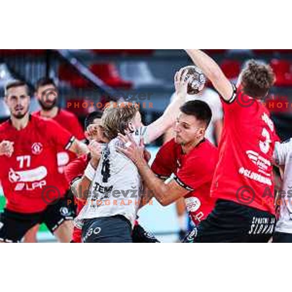 Lovro Viscek in action during 1.NLB League handball match between LL Grosist Slovan and Trimo Trebnje in Ljubljana, Slovenia on September 20, 2024