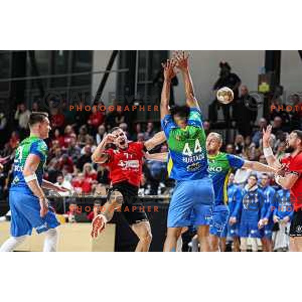Gasper Hrastnik in action during 1.NLB League handball match between LL Grosist Slovan and Celje in Ljubljana, Slovenia on October 22, 2024