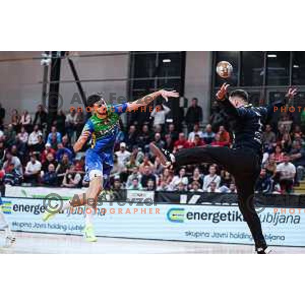 in action during 1.NLB League handball match between LL Grosist Slovan and Celje in Ljubljana, Slovenia on October 22, 2024