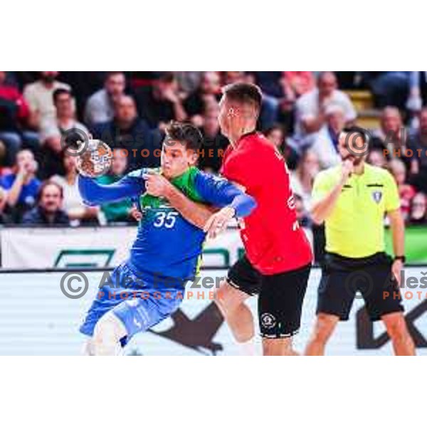 Andraz Makuc in action during 1.NLB League handball match between LL Grosist Slovan and Celje in Ljubljana, Slovenia on October 22, 2024