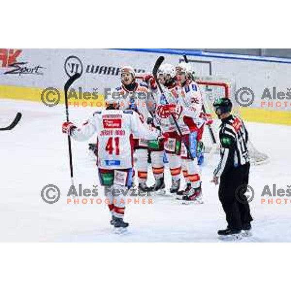 Jesper Aabo Jensen, Senna Peeters and other players of KAC Klagenfurt celebrate goal during IceHL hockey match between SZ Olimpija and KAC Klagenfurt in Ljubljana, Slovenia on November 17, 2024. Photo: Filip Barbalic