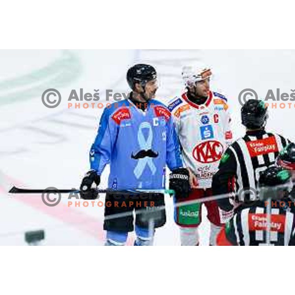 Ziga Pavlin of SZ Olimpija and Thomas Hundertpfund of KAC Klagenfurt in action during IceHL hockey match between SZ Olimpija and KAC Klagenfurt in Ljubljana, Slovenia on November 17, 2024. Photo: Filip Barbalic