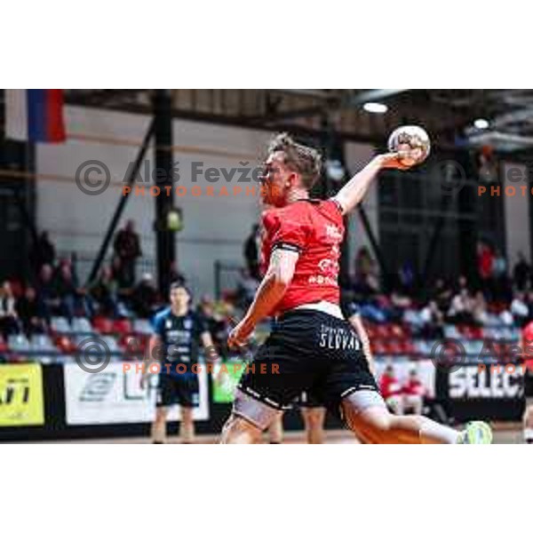 Stas Slatinek Jovicic in action during 1.NLB League handball match between LL Grosist Slovan and Slovenj Gradec in Ljubljana, Slovenia on November 22, 2024