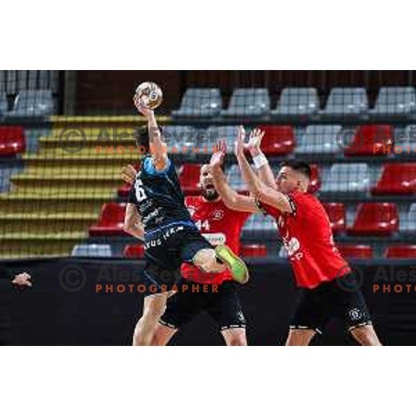 in action during 1.NLB League handball match between LL Grosist Slovan and Slovenj Gradec in Ljubljana, Slovenia on November 22, 2024