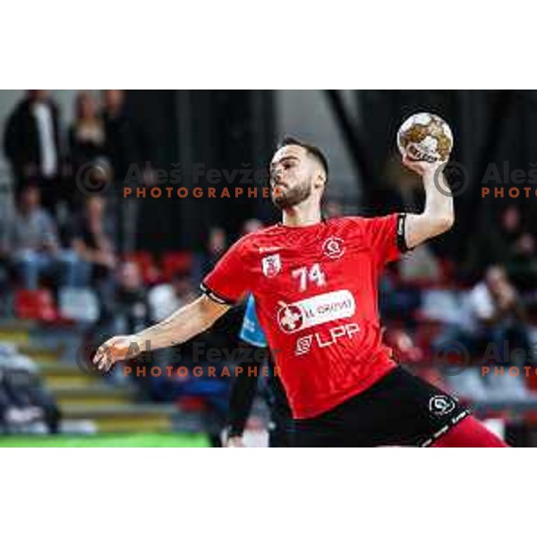 Bruno Vili Zobec in action during 1.NLB League handball match between LL Grosist Slovan and Slovenj Gradec in Ljubljana, Slovenia on November 22, 2024
