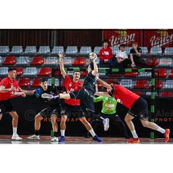 in action during 1.NLB League handball match between LL Grosist Slovan and Slovenj Gradec in Ljubljana, Slovenia on November 22, 2024