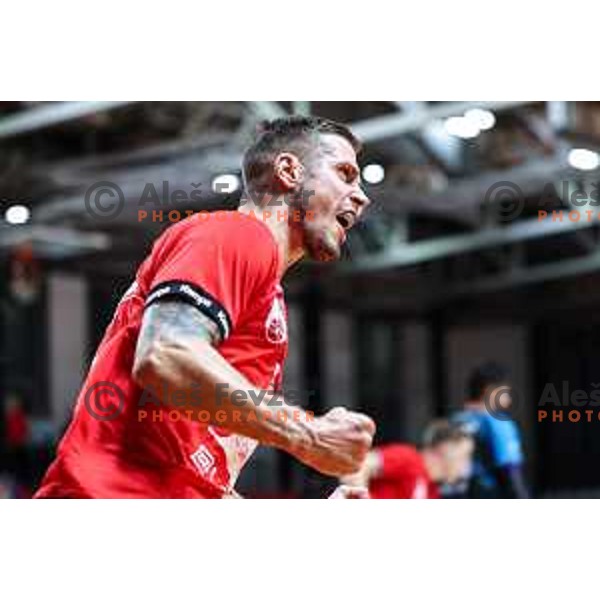 Gasper Hrastnik in action during 1.NLB League handball match between LL Grosist Slovan and Slovenj Gradec in Ljubljana, Slovenia on November 22, 2024