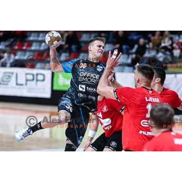 in action during 1.NLB League handball match between LL Grosist Slovan and Slovenj Gradec in Ljubljana, Slovenia on November 22, 2024