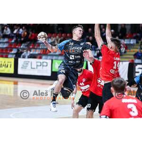 in action during 1.NLB League handball match between LL Grosist Slovan and Slovenj Gradec in Ljubljana, Slovenia on November 22, 2024