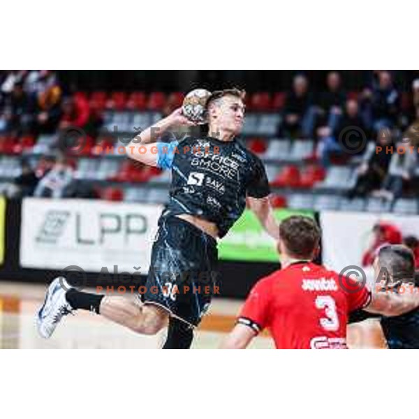 in action during 1.NLB League handball match between LL Grosist Slovan and Slovenj Gradec in Ljubljana, Slovenia on November 22, 2024