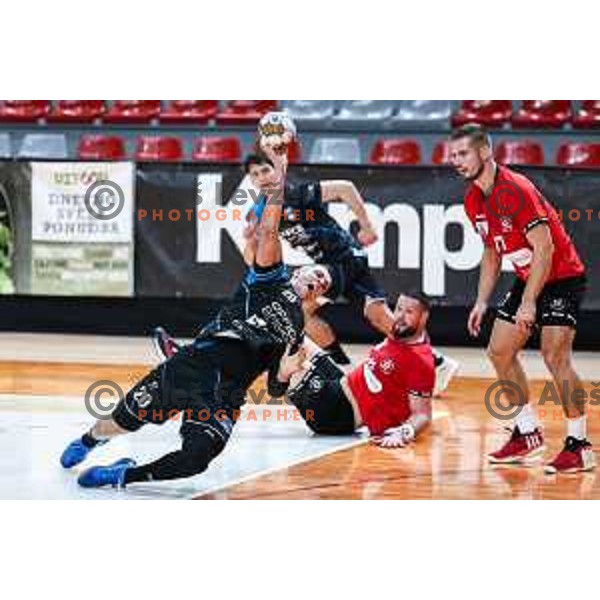 David Svecko in action during 1.NLB League handball match between LL Grosist Slovan and Slovenj Gradec in Ljubljana, Slovenia on November 22, 2024