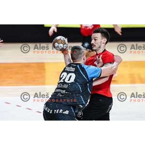 David Svecko and Jaka Malus in action during 1.NLB League handball match between LL Grosist Slovan and Slovenj Gradec in Ljubljana, Slovenia on November 22, 2024