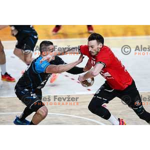 David Svecko and Jaka Malus in action during 1.NLB League handball match between LL Grosist Slovan and Slovenj Gradec in Ljubljana, Slovenia on November 22, 2024