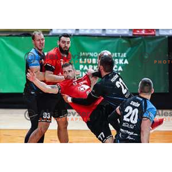 in action during 1.NLB League handball match between LL Grosist Slovan and Slovenj Gradec in Ljubljana, Slovenia on November 22, 2024