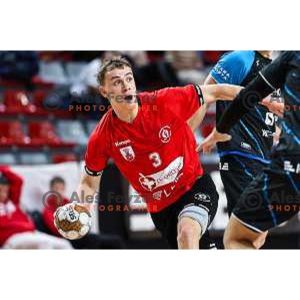 Stas Slatinek Jovicic in action during 1.NLB League handball match between LL Grosist Slovan and Slovenj Gradec in Ljubljana, Slovenia on November 22, 2024