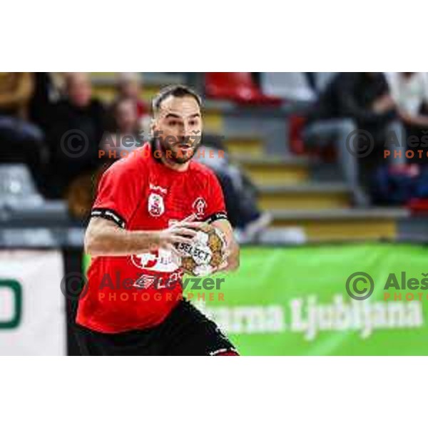 Bruno Vili Zobec in action during 1.NLB League handball match between LL Grosist Slovan and Slovenj Gradec in Ljubljana, Slovenia on November 22, 2024