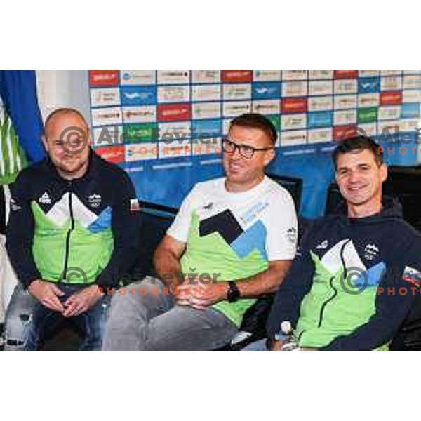 Tomaz Torkar, Gorazd Podrzavnik, head coach of Slovenia Swimming team, Luka Berdajs during press conference in Ljubljana on November 27, 2024