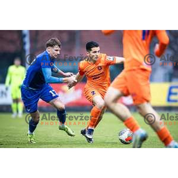 Dominik Csoka vs Juan Jose Nieto Zarzoso in action during Prva liga Telemach football match between Nafta and Celje in Sportni park Lendava, Slovenia on December 1, 2024. Photo: Jure Banfi
