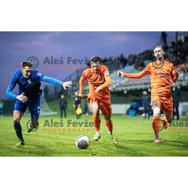 Rok Pirtovsek vs Ivan Brnic in action during Prva liga Telemach football match between Nafta and Celje in Sportni park Lendava, Slovenia on December 1, 2024. Photo: Jure Banfi