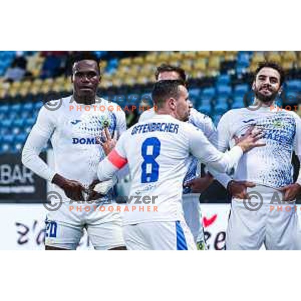 Danijel Sturm and players of Domzale celebrate goal at Prva liga Telemach 2024/2025 football match between Celje and Domzale in Celje, Slovenia on December 7, 2024