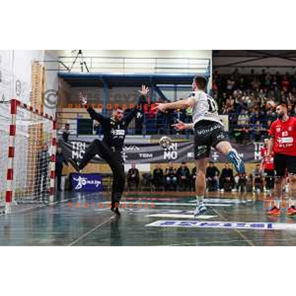 In action during 1.NLB League handball match between Trimo Trebnje and Slovan LL Grosist in Trebnje, Slovenia on December 7, 2024