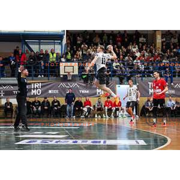 In action during 1.NLB League handball match between Trimo Trebnje and Slovan LL Grosist in Trebnje, Slovenia on December 7, 2024