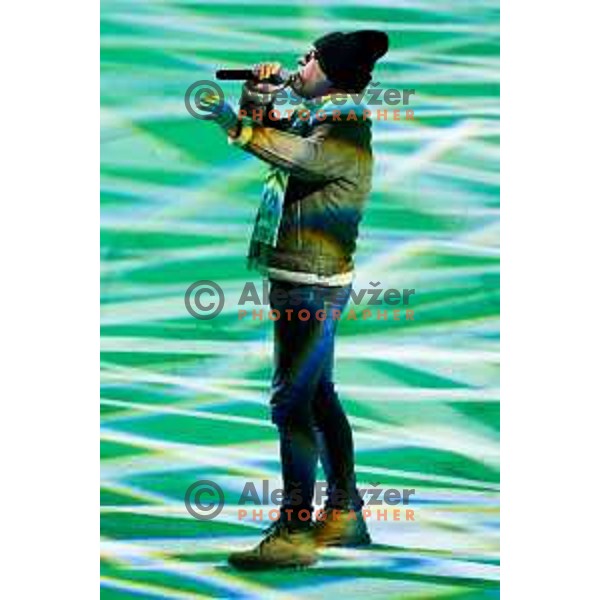 Slovenian singer, Vili Resnik singing during break at IceHL hockey match between SZ Olimpija and Hydro Fehervar AV19 in Ljubljana, Slovenia on Decemeber 22, 2024. Photo: Filip Barbalic