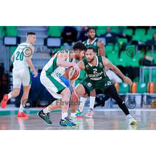 Tayler Persons and Devante Jones in action during ABA League 2024/2025 basketball match between Cedevita Olimpija and Krka in Ljubljana, Slovenia on January 5, 2025