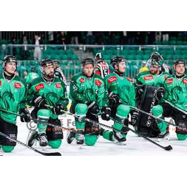 Nik Simsic, Robert Sabolic and Rudolf Cerveny celebrate victory at the IceHL regular season 2024/2025 ice-hockey match between SZ Olimpija and Pustertal Wolfe in Ljubljana, Slovenia on January 8, 2025