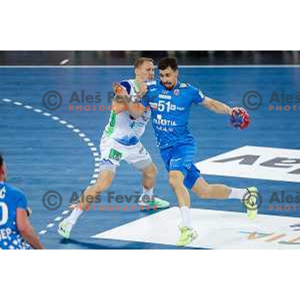 Tilen Kodrin of Slovenia and Ivan Martinovic of Croatia during preparation match for World Handball Championship 2025 between Croatia and Slovenia in Zagreb, Croatia on January 10, 2025