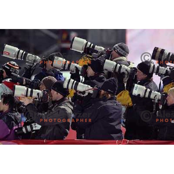 Photographers shooting at 120 m individual ski jumping event in Pragelato at Torino 2006 Winter Olympic games, Italy on February 18, 2006