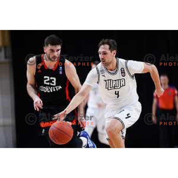 Tadej Ferme of Ilirija in action during ABA 2 League Playoff basketball match between Ilirija and Cedevita Junior in Hala Tivoli, Ljubljana, Slovenia on January 14, 2025. Photo: Filip Barbalic
