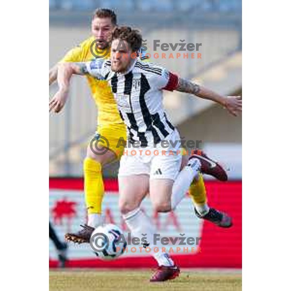 Nikola Buric and Kai Cipot in action during Prva liga Telemach 2024/2025 football match between Domzale and Mura in Domzale on February 8, 2025