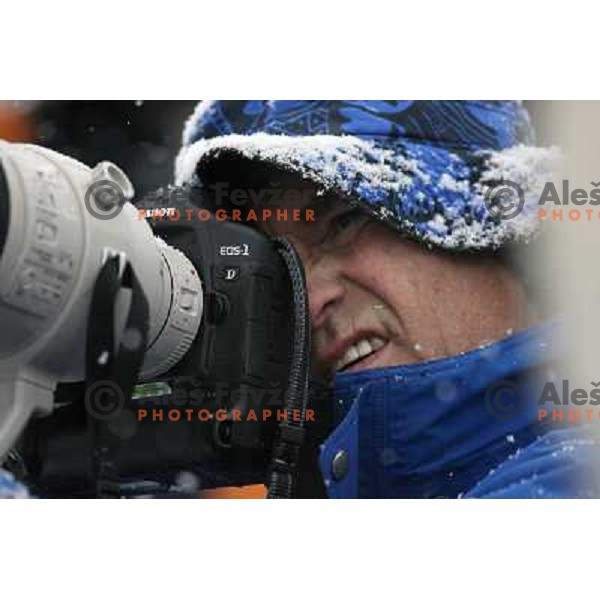 Photographer working in snow