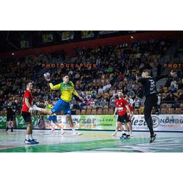 Oleksandr Onufriienko vs Rok Zaponsek in action during 1.NLB League handball match between RK Celje PL and LL Grosist Slovan in Dvorana Zlatorog, Celje, Slovenia on February 22, 2025. Photo: Jure Banfi