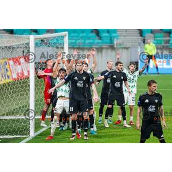 Jorge Silva and Robert Caks in action during Prva liga Telemach 2024/2025 football match between Olimpija and Mura in Ljubljana, Slovenia on March 12, 2025