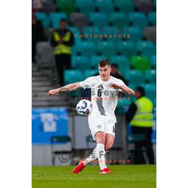 Jaka Bijol of Slovenia in action during UEFA Nations League 2025 play-off match between Slovenia and Slovakia in Arena Stozice, Ljubljana, Slovenia on March 23, 2025
