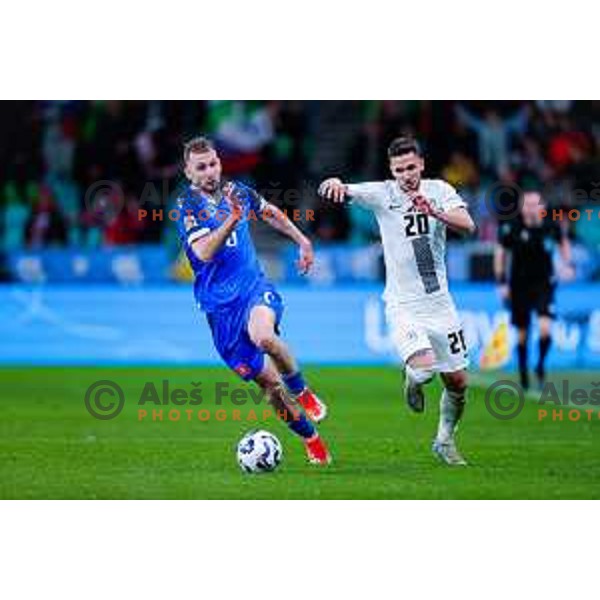 Petar Stojanovic of Slovenia in action during UEFA Nations League 2025 play-off match between Slovenia and Slovakia in Arena Stozice, Ljubljana, Slovenia on March 23, 2025