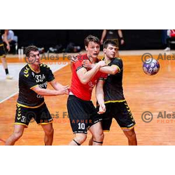 Jure Dolenec in action during 1.NLB League handball match between LL Grosist Slovan and Gorenje Velenje in Ljubljana, Slovenia on March 28, 2025. Photo: Filip Barbalic