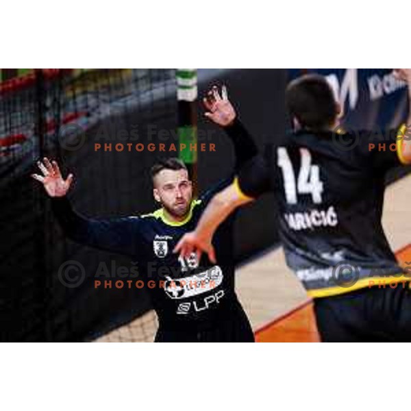 Aljaz Panjtar in action during 1.NLB League handball match between LL Grosist Slovan and Gorenje Velenje in Ljubljana, Slovenia on March 28, 2025. Photo: Filip Barbalic