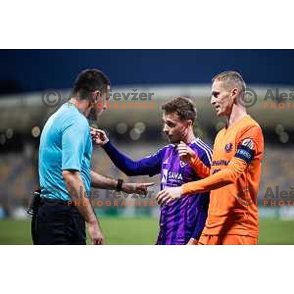 Referee Rade Obrenovic, Jan Repas and Zan Karnicnik during Slovenian Cup 2024/25 quarter-finals football match between Maribor and Celje in Ljudski vrt, Maribor, Slovenia on April 2, 2025. Photo: Jure Banfi
