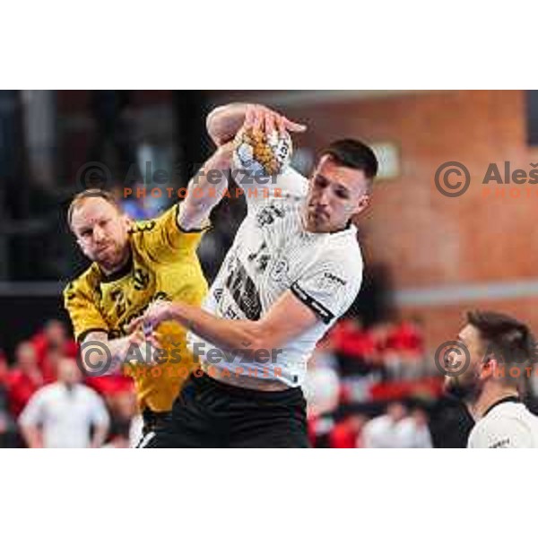 Tine Poklar of Gorenje Velenje and Leon Ljevar of LL Grosist Slovan in action during Semifinal of Slovenian Handball Cup between LL Grosist Slovan and Gorenje Velenje in Ljubljana, Slovenia on April 4, 2025. Photo: Filip Barbalic