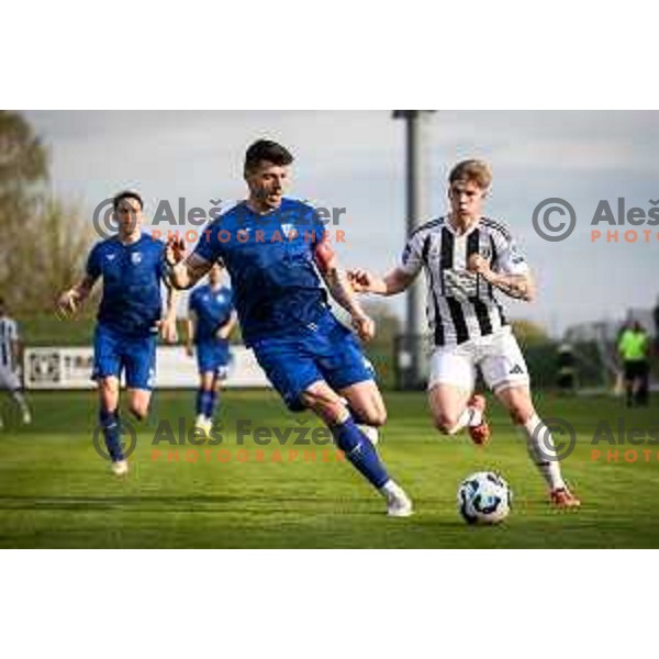 Zoran Lesjak vs Jaka Domjan in action during Prva liga Telemach football match between Nafta 1903 and Mura in Sportni park Lendava, Slovenia on April 5, 2025. Photo: Jure Banfi