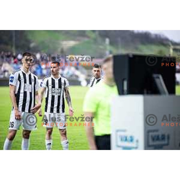 Borna Proleta, Dario Vizinger and Amadej Marosa waiting for referee Alen Borosak VAR observation during Prva liga Telemach football match between Nafta 1903 and Mura in Sportni park Lendava, Slovenia on April 5, 2025. Photo: Jure Banfi