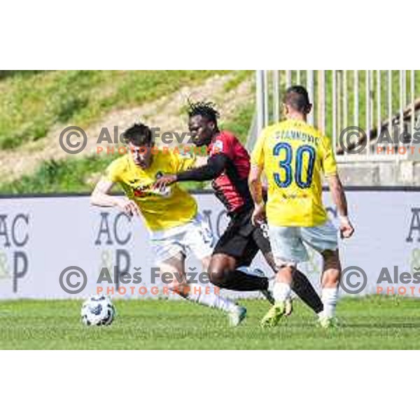 Gasper Jovan and Ishaq Rafiu in action during Prva liga Telemach 2024/2025 football match between Primorje and Bravo Big Bang in Ajdovscina, Slovenia on April 10, 2025