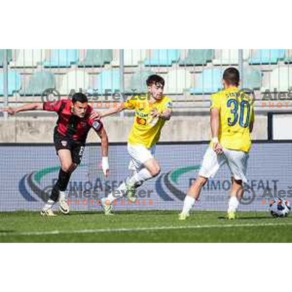 Mirko Mutavcic and Gasper Jovan in action during Prva liga Telemach 2024/2025 football match between Primorje and Bravo Big Bang in Ajdovscina, Slovenia on April 10, 2025