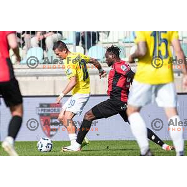 Jakoslav Stankovic and Ishaq Rafiu in action during Prva liga Telemach 2024/2025 football match between Primorje and Bravo Big Bang in Ajdovscina, Slovenia on April 10, 2025